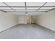 Bright, oversized garage with a smooth concrete floor and abundant storage space at 622 Bellemeade Nw Ave # 2, Atlanta, GA 30318