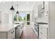 Bright kitchen featuring stainless appliances, a center island and large windows at 622 Bellemeade Nw Ave # 2, Atlanta, GA 30318