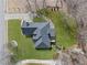 Overhead shot of a single Gathering home with well-manicured lawn and mature trees in a suburban setting at 31 Roberson Ne Dr, Cartersville, GA 30121