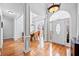 Spacious foyer with gleaming hardwood floors, high ceilings, and elegant architectural details at 31 Roberson Ne Dr, Cartersville, GA 30121