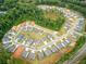 Aerial view of a new housing community nestled among lush trees at 3114 Thicket Ln, Atlanta, GA 30349