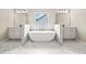Luxurious bathroom features dual sinks, a soaking tub, and marble countertops for a spa-like experience at 3114 Thicket Ln, Atlanta, GA 30349