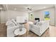 Bright and inviting living room provides hardwood floors, a fireplace, and comfortable furniture at 3114 Thicket Ln, Atlanta, GA 30349