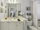 Well-lit bathroom featuring a vanity with ample counter space, a large mirror, and a tub with shower at 424 Lindbergh Ne Dr # 201, Atlanta, GA 30305