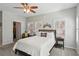 Inviting bedroom featuring neutral paint, carpet, ceiling fan and plantation shutters for natural light at 424 Lindbergh Ne Dr # 201, Atlanta, GA 30305