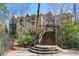 Exterior view of the condo building, accessible via a wooden staircase at 424 Lindbergh Ne Dr # 201, Atlanta, GA 30305