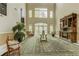 Grand two-story foyer with soaring ceilings, large windows, and decorative rug at 424 Lindbergh Ne Dr # 201, Atlanta, GA 30305