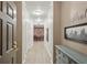 Hallway with light hardwood floors leading to a dining area and neutral walls at 424 Lindbergh Ne Dr # 201, Atlanta, GA 30305