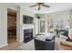 Inviting living room with fireplace, built-ins, and french doors to private balcony, perfect for relaxing or entertaining at 424 Lindbergh Ne Dr # 201, Atlanta, GA 30305