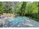 Community pool with surrounding deck space for lounge chairs and shade at 424 Lindbergh Ne Dr # 201, Atlanta, GA 30305