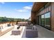 Rooftop terrace with outdoor seating and views of lush greenery at 622 Bellemeade Nw Ave # 3, Atlanta, GA 30318
