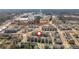 Aerial view of neighborhood and surrounding area with retail businesses and restaurants close by at 219 Dawson Dr, Woodstock, GA 30188