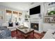 Inviting living room features fireplace, plush seating, and elegant decor, creating a relaxing retreat at 219 Dawson Dr, Woodstock, GA 30188