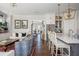Open living space with a kitchen bar, a fireplace and sophisticated decorations at 219 Dawson Dr, Woodstock, GA 30188