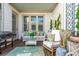 Cozy outdoor deck features comfortable seating, tasteful decor, and a serene setting perfect for relaxing at 219 Dawson Dr, Woodstock, GA 30188