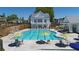 Resort-style community pool with plenty of lounge chairs, shade and seating areas creates a relaxing oasis at 219 Dawson Dr, Woodstock, GA 30188