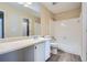 Full bathroom featuring a large vanity area and a shower and tub with white tile at 3852 Woodridge Way, Tucker, GA 30084
