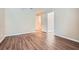 Spacious bedroom featuring modern wood floors, neutral walls and natural light at 3852 Woodridge Way, Tucker, GA 30084
