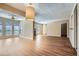 Spacious living room with many windows allowing for lots of natural light and wood flooring at 3852 Woodridge Way, Tucker, GA 30084