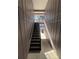 A well-maintained stairway with metal railings providing access to upper levels at 3852 Woodridge Way, Tucker, GA 30084
