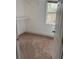 This closet has shelving with carpet floors and a window at 409 Inman Sw St, Atlanta, GA 30310