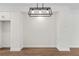Dining area featuring a modern light fixture, and minimalist decor at 622 Bellemeade Nw Ave # 4, Atlanta, GA 30318