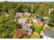 Aerial view of fenced in backyard with lush green grass, deck and shed at 1471 Hardin Ave, College Park, GA 30337