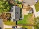 Aerial view of a landscaped backyard showcasing an upper-level deck, patio, shed and privacy fence at 1471 Hardin Ave, College Park, GA 30337