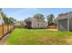 Picture of home featuring backyard, upper level deck and privacy fence at 1471 Hardin Ave, College Park, GA 30337