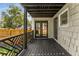 Exterior deck featuring a geometric railing design and beautiful backyard at 1471 Hardin Ave, College Park, GA 30337
