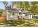 Charming two-story home with landscaped yard and inviting brick stairs to the front door at 1471 Hardin Ave, College Park, GA 30337