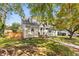 Charming two-story home with landscaped yard and inviting brick stairs to the front door at 1471 Hardin Ave, College Park, GA 30337