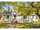 Charming two-story home with landscaped yard and inviting brick stairs to the front door at 1471 Hardin Ave, College Park, GA 30337