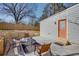 Back patio with ample seating, perfect for outdoor entertaining and enjoying the private backyard at 1667 Grace Se St, Atlanta, GA 30316