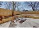 Backyard patio with outdoor seating and a wooden fence at 1667 Grace Se St, Atlanta, GA 30316