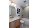 Beautiful bathroom featuring herringbone tile, marble countertops and modern fixtures at 1667 Grace Se St, Atlanta, GA 30316