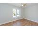 Bright bedroom features a large window and beautiful hardwood floors at 1667 Grace Se St, Atlanta, GA 30316