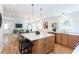 Well-lit kitchen with island, stainless steel appliances, and hardwood floors at 1667 Grace Se St, Atlanta, GA 30316