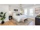Serene main bedroom with hardwood floors, stylish decor, and large windows for natural light at 1667 Grace Se St, Atlanta, GA 30316
