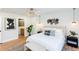 Stylishly decorated main bedroom featuring a ceiling fan and ensuite bathroom access at 1667 Grace Se St, Atlanta, GA 30316