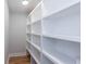 Walk-in pantry with custom shelving for optimal storage, helping keep your kitchen organized and clutter-free at 1667 Grace Se St, Atlanta, GA 30316