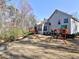 Well-maintained backyard with a playset, lawn, and deck, perfect for outdoor enjoyment at 2157 Killian Nw Way, Kennesaw, GA 30152