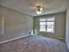 Spacious bedroom with carpet, a ceiling fan and a large window allowing ample light at 2157 Killian Nw Way, Kennesaw, GA 30152