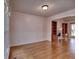 Dining room featuring hardwood floors, chair railing, and a view of the living room and windows at 2157 Killian Nw Way, Kennesaw, GA 30152