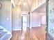 Inviting entryway with hardwood floors, high ceilings and a charming leaded glass front door at 2157 Killian Nw Way, Kennesaw, GA 30152
