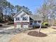 Beautiful two-story home with a two-car garage, front porch, and landscaped yard at 2157 Killian Nw Way, Kennesaw, GA 30152