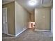 Hallway with neutral walls and carpet flooring, showcasing access to various rooms at 2157 Killian Nw Way, Kennesaw, GA 30152