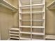 Organized walk-in closet with built-in shelving and ample storage space for clothing and accessories at 2157 Killian Nw Way, Kennesaw, GA 30152