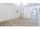 Bedroom and hallway with overhead lighting and wood grain flooring at 2177 American Legion Rd, Dacula, GA 30019