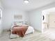 Bedroom with light wood grain flooring and natural light at 2177 American Legion Rd, Dacula, GA 30019